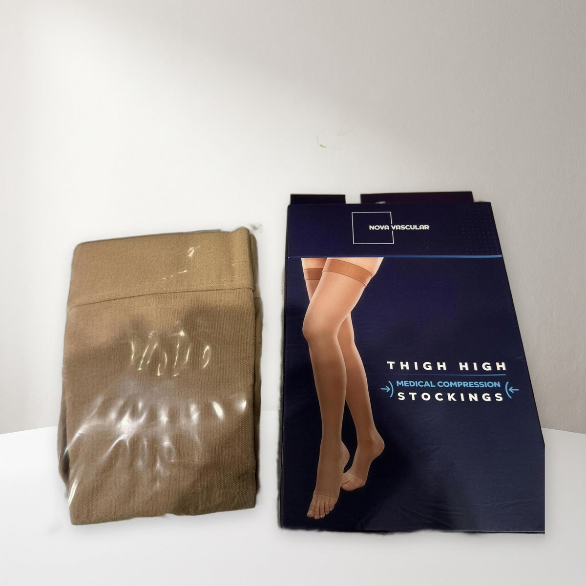 Nova Vascular compression stockings — box with beige pair