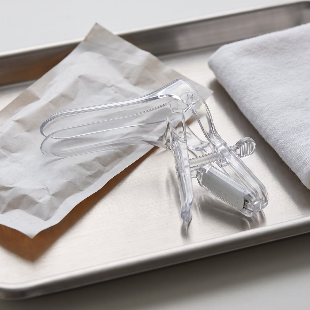 Disposable Vaginal Speculum with Integrated LED — in a clinical setting
